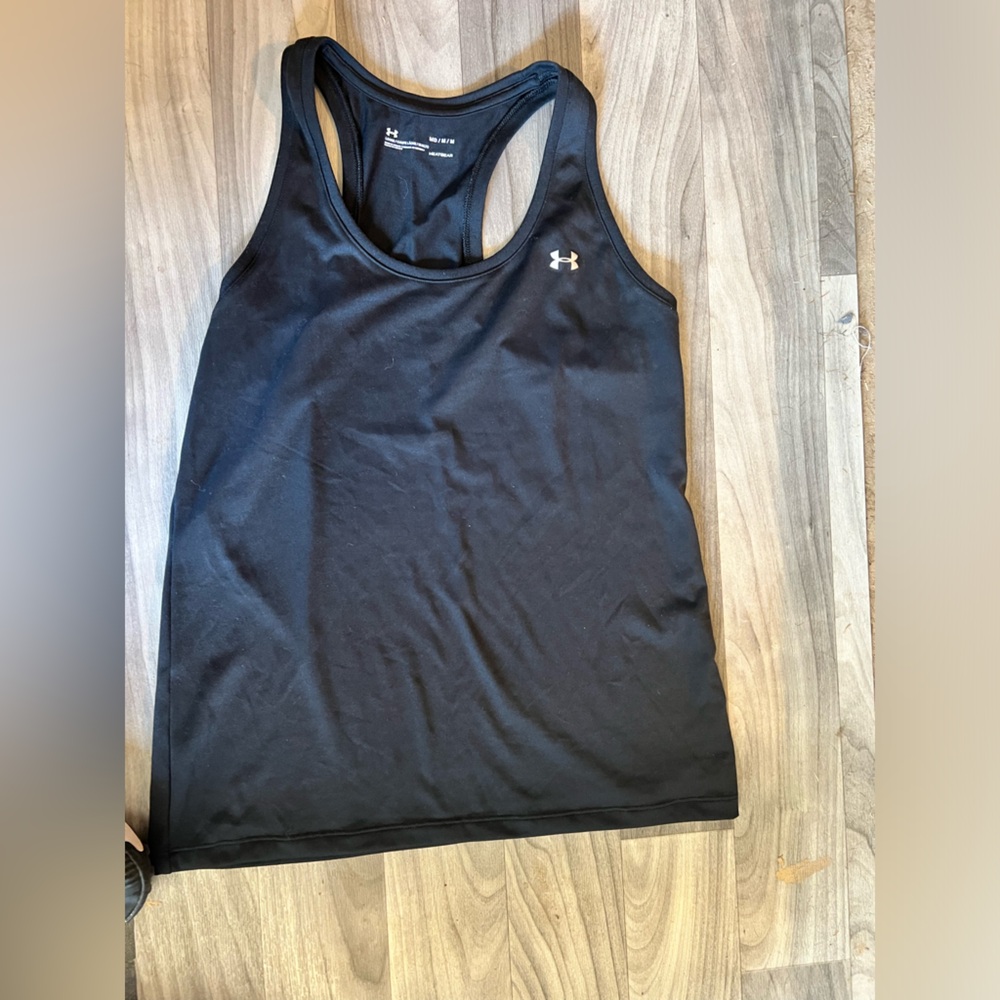 Women’s under Armour black tech tank medium   Please see all photos.